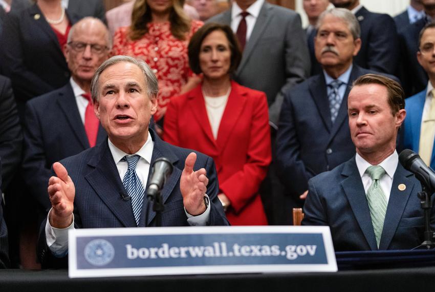 From left: Gov. Greg Abbott and House Speaker Dade Phelan gave updates on their plan for Texas to build its own border wall at a press conference at the Texas Capitol on June 16, 2021.