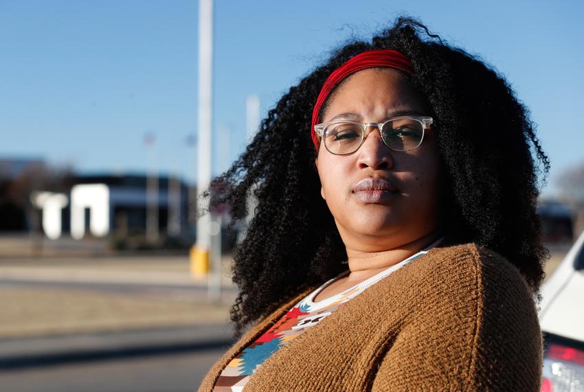 Tracy Kemp stands outside of Laura Bush Middle School on Dec. 14, 2022. Both of Kemp’s sons attend Lubbock-Cooper ISD schools and have been experiencing racism from classmates throughout this school year.