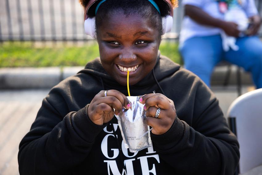 Danielle Stephen, 20, has a beverage she received at Montrose Street Reach on Wednesday, May 8, 2024, in Houston. Montrose Street Reach is an organization dedicated to transitioning at-risk people off the streets.