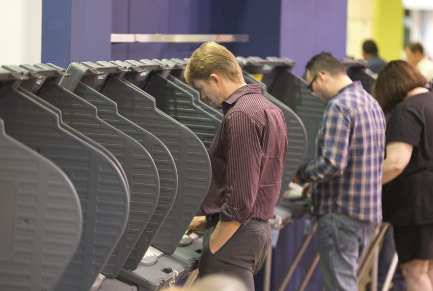 Travis County voters cast ballots at Highland Mall on Nov. 4, 2014.