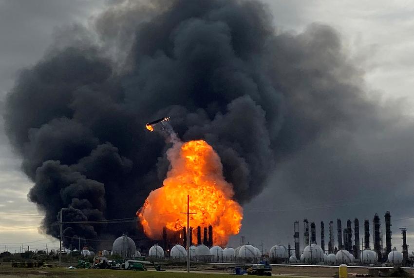 A process tower flies through the air after exploding at the TPC Group Petrochemical Plant, after an earlier massive explosion sparked a blaze at the plant in Port Neches on Nov. 27, 2019.