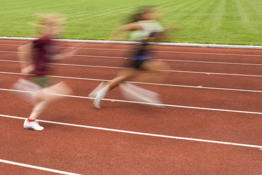 Track athletes at a school track meet.