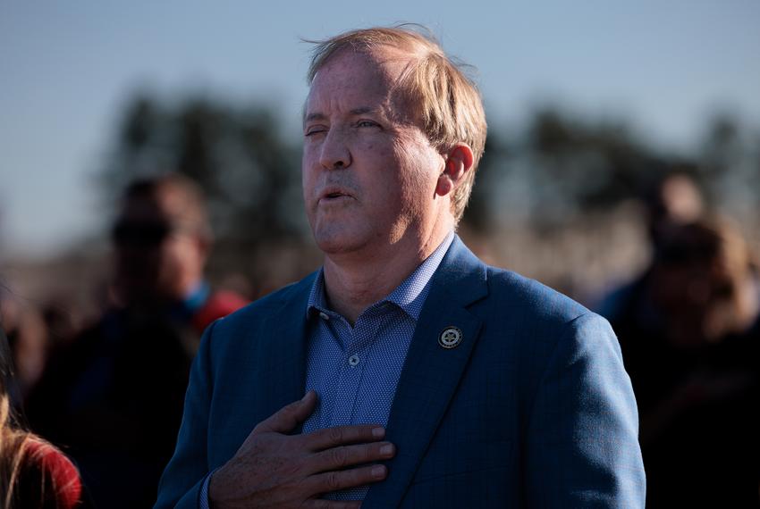 Attorney General Ken Paxton recites the pledge of allegiance at a Trump Rally in Conroe on January 29, 2022.