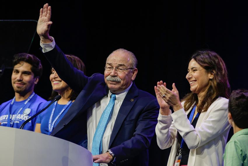 Gilberto Hinojosa waves at the conclusion of his acceptance speech of his re-election to Texas Democratic Party Chair during the general caucus of the Texas Democratic Convention at the Kay Bailey Hutchison Convention Center in Dallas on July 16, 2022.