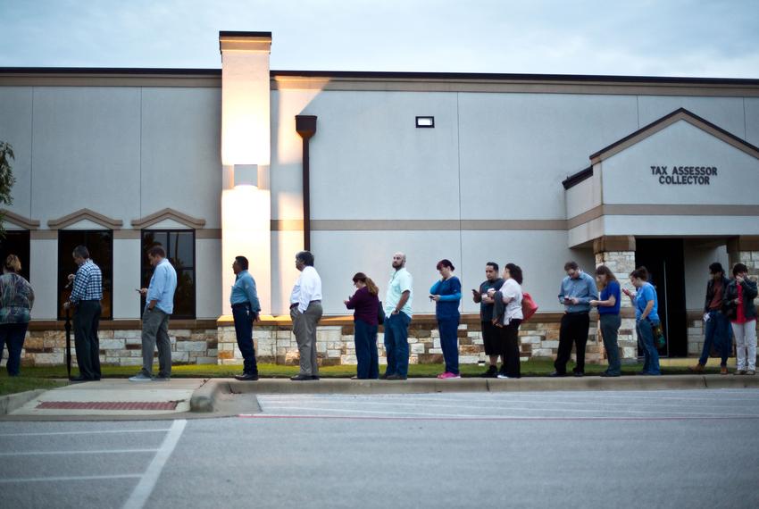 Voters wait in line before polls open on Election Day in Round Rock on Nov 8, 2016.