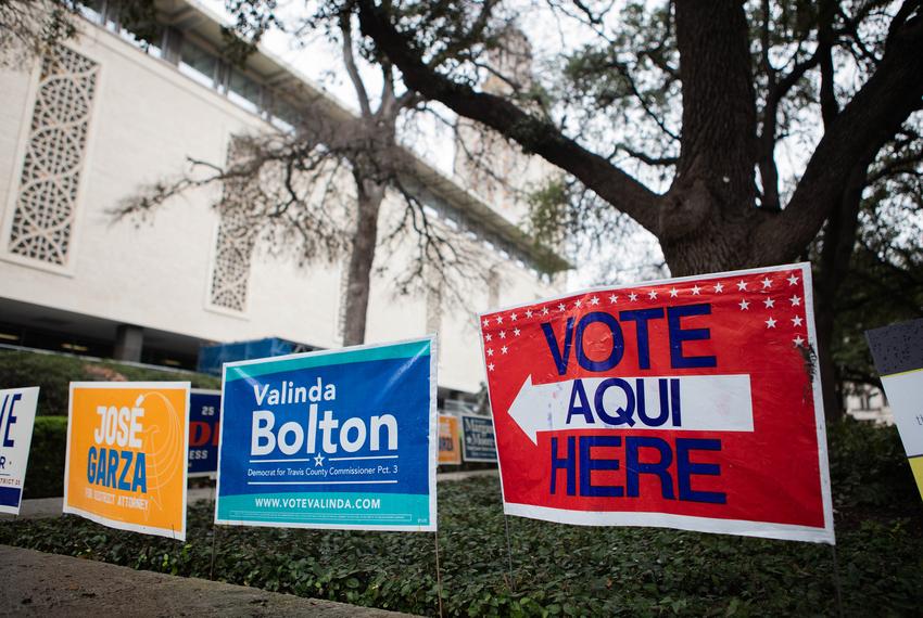 Voting signs at The University of Texas at Austin campus on Feb. 19, 2020, the second day of early voting for the Texas Priamary.