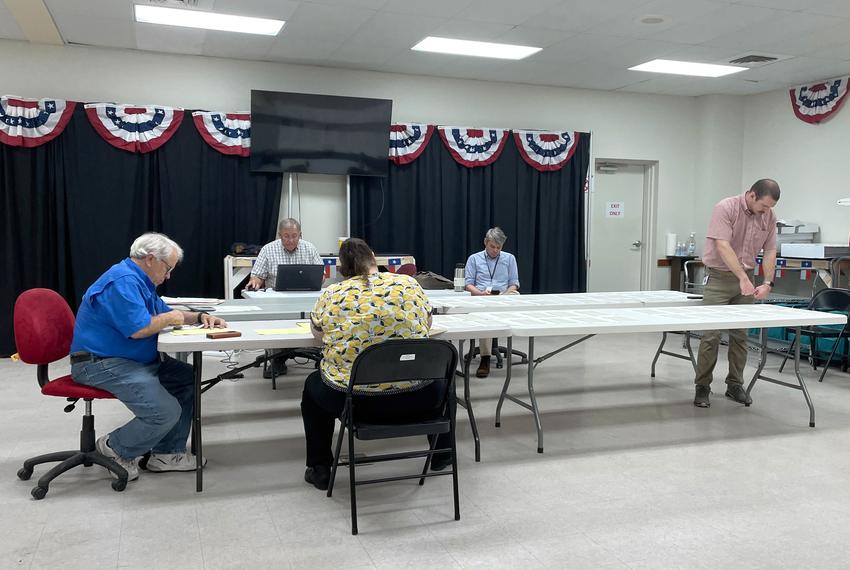 From left, Gillespie County elections administrator Jim Riley, Gillespie County Republican Party Chair Bruce Campbell, Gillespie elections staffer Alan Littman and election worker Joy Smith work on aggregating election results before submitting them to the Texas Secretary of State’s office on Thursday, March 14, 2024, after the canvass and certification of the Gillespie County Republican primary. 