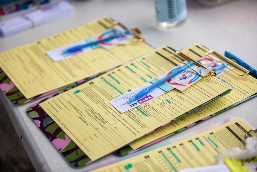 Voter registration forms at a registration event in Austin, on Sept. 27, 2020.